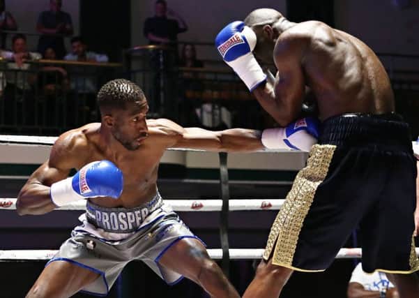 Kay Prosper unloads against Nathan Weise - pic: Natalie Mayhew, Butterfly Boxing